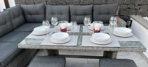 1029big-playa-blanca-villa-villa-arabella-outside-lounging-area-with-set-table